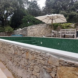 Rénovation de piscine débordement, avec revêtement en petit mosaïque 18