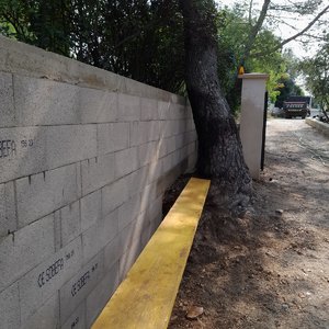 Création d'un mur de soutènement, en agglos à banche et finition en crepis 6