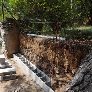 Création d'un mur de soutènement, en agglos à banche et finition en crepis 3